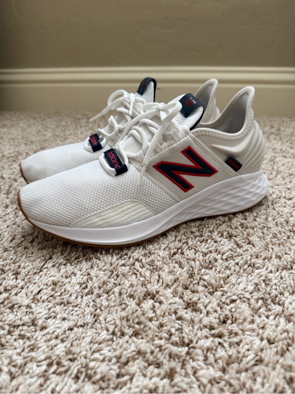 New Balance Men’s Fresh Foam Roav White Sneakers with Red and Navy Accents